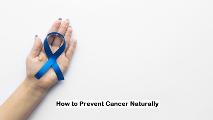 a cancer ribbon in hand